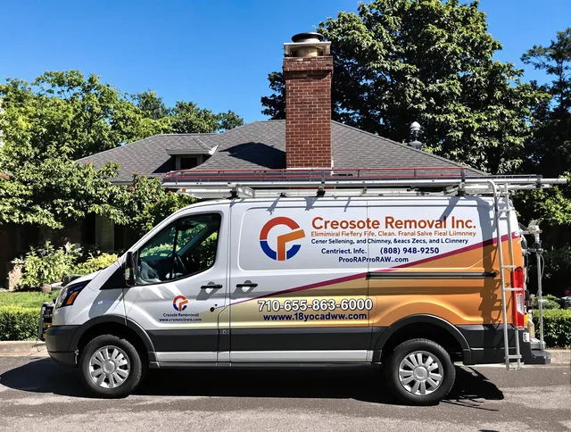 Kissimmee Chimney Sweep technician removing creosote safely in Kissimmee, FL